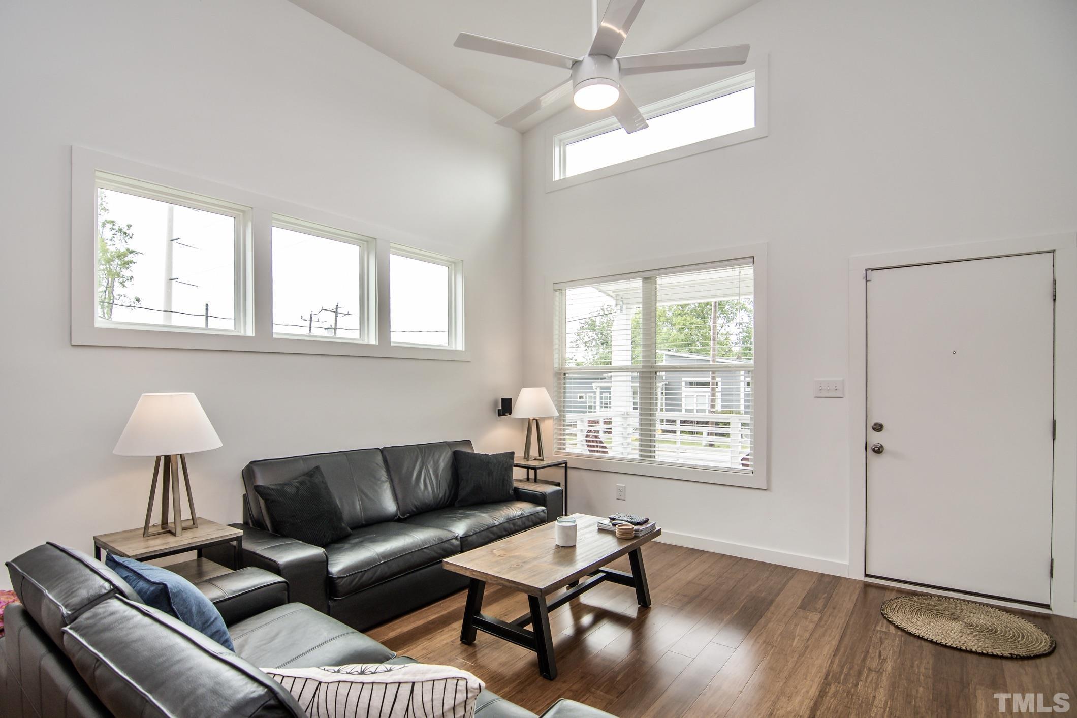 1309 South East Street Raleigh, NC 27601 - Photo 5 of 29 a living room with furniture and a window