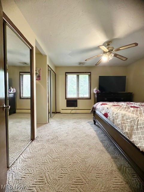 41810 Parsons Road Lagrange, OH 44050 - Photo 9 of 19 Bedroom with a baseboard radiator, ceiling fan, and light colored carpet