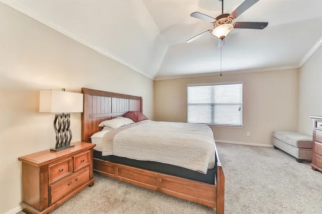 a spacious bathroom with a tub sink shower and mirror