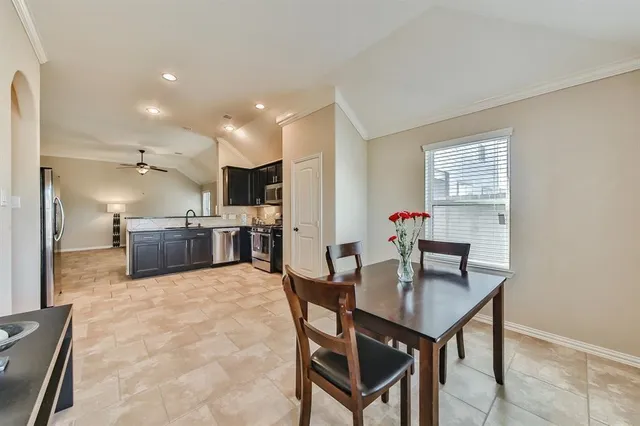 a bed room with a bed and a window