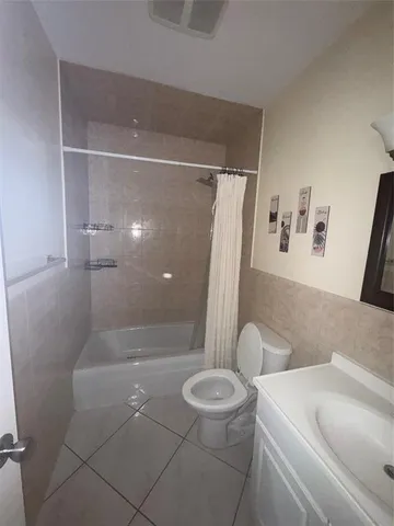 a bathroom with a sink and a shower