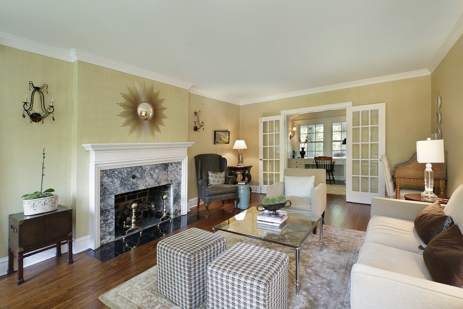 579 Hill Terrace Winnetka, IL 60093 - Photo 3 of 31 a living room with furniture and a fireplace