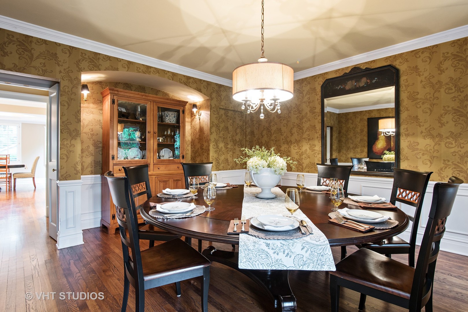 579 Hill Terrace Winnetka, IL 60093 - Photo 5 of 31 a view of a dining room with furniture wooden floor and chandelier