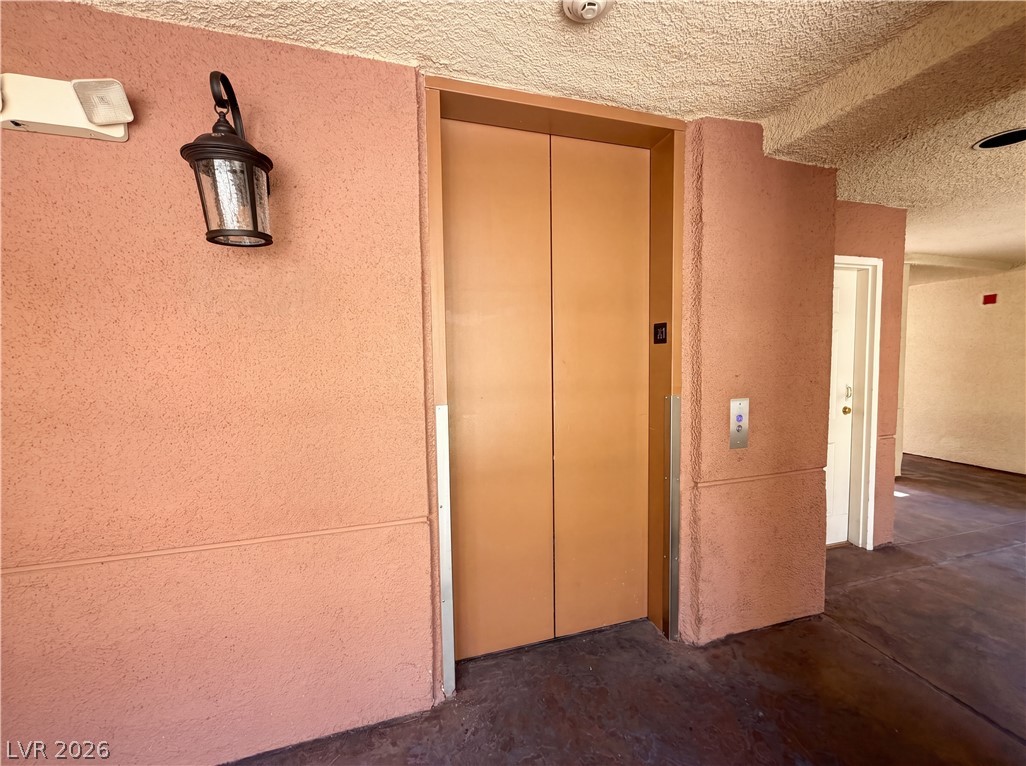 230 East Flamingo Road, Unit 320 Las Vegas, NV 89169 - Photo 15 of 19 Elevator access enhances convenience in this well-maintained common area.