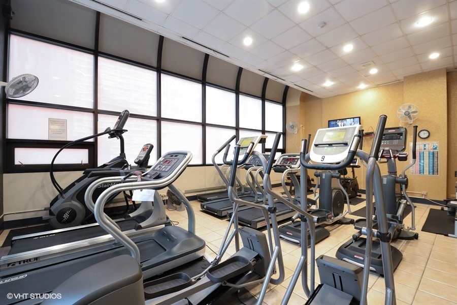 Undisclosed Address Chicago, IL 60611 - Photo 15 of 19 a view of a room with gym equipment