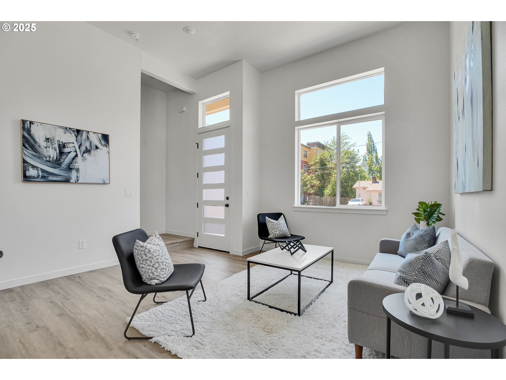 94 Northeast 148th Avenue, Unit 1 Portland, OR 97230 - Photo 33 of 39 a living room with furniture and a window