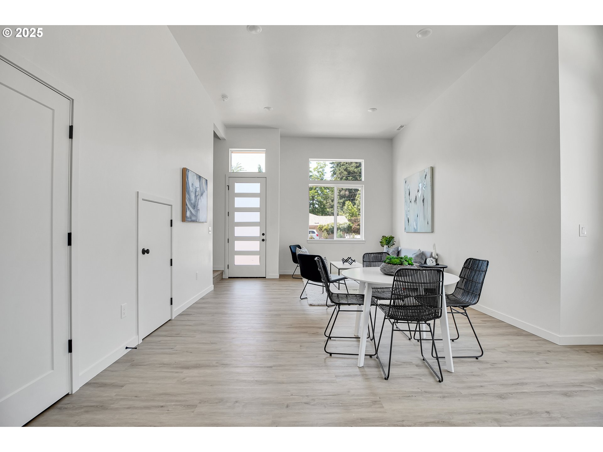 94 Northeast 148th Avenue, Unit 1 Portland, OR 97230 - Photo 5 of 39 a view of a dining room with furniture and windows