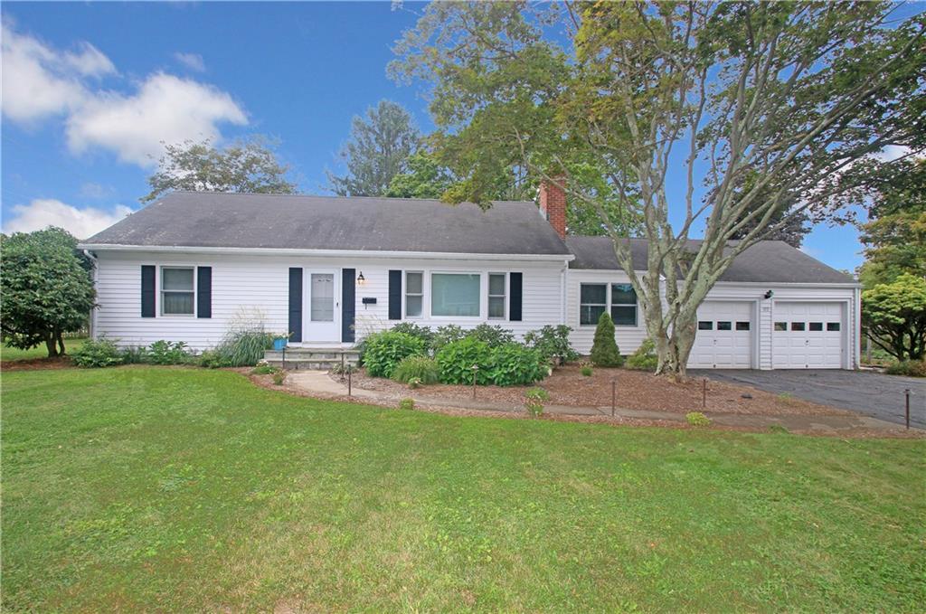 103 Ridgeview Avenue Trumbull, CT 06611 - Photo 1 of 1 a front view of a house with a garden