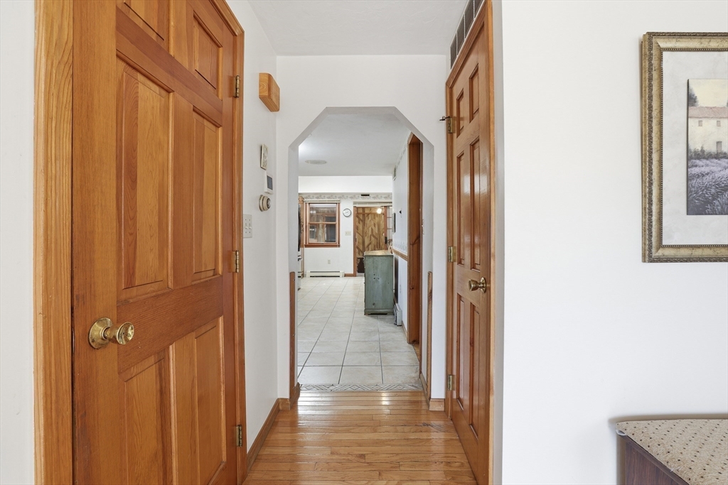 7 Swift Avenue Wareham, MA 02571 - Photo 12 of 42 a view of a hallway with a livingroom and a bathroom with sink