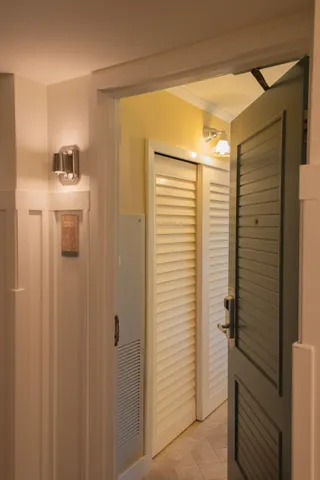 a bathroom with a shower and a sink