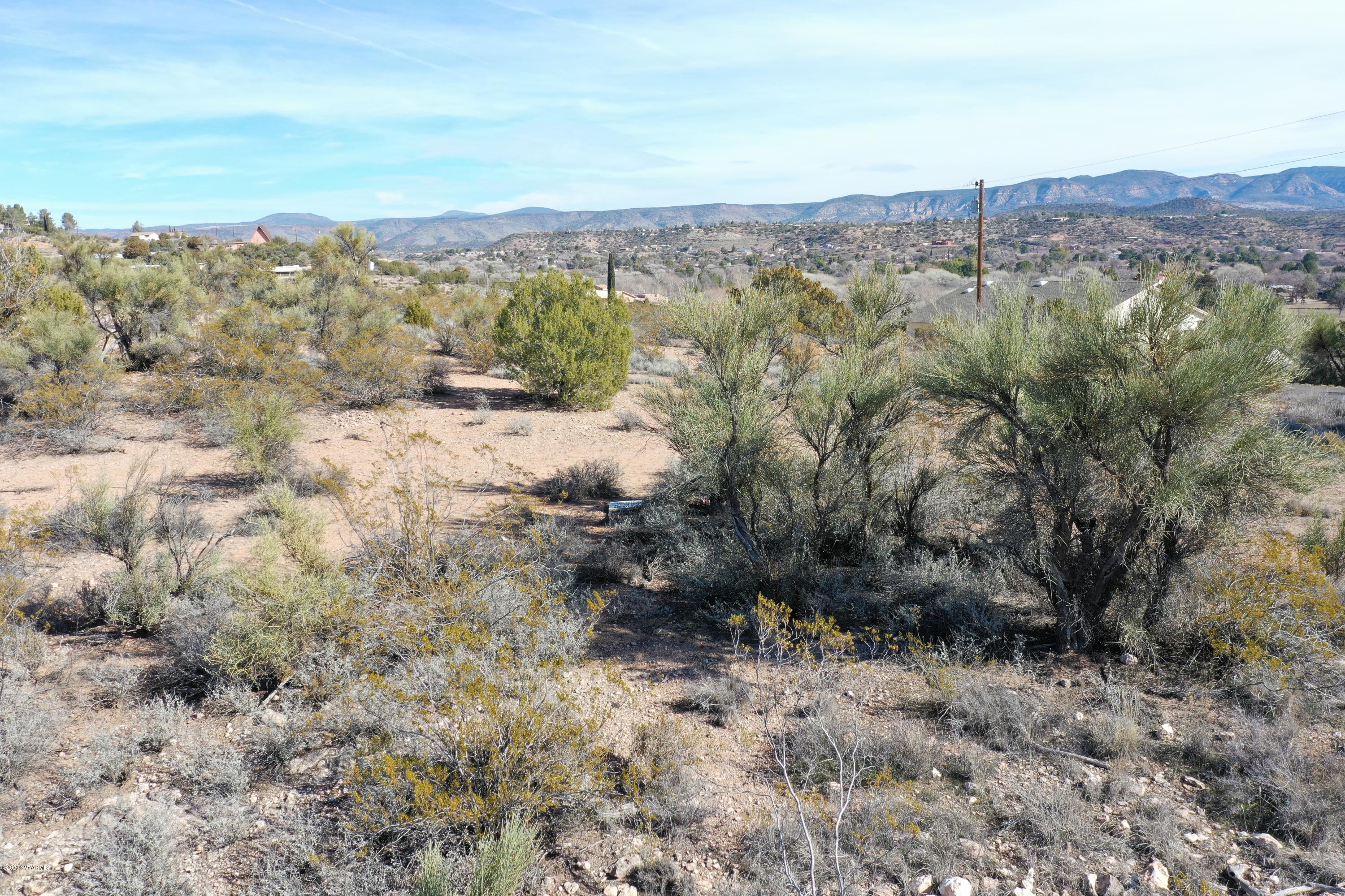 3210 Pony Express Pass Rimrock, AZ 86335 - Photo 16 of 24 a view of a forest with mountains in the background
