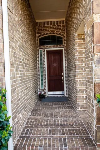 a front view of a house with a shower