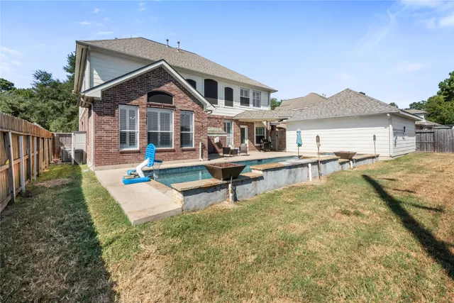 a house view with a garden space