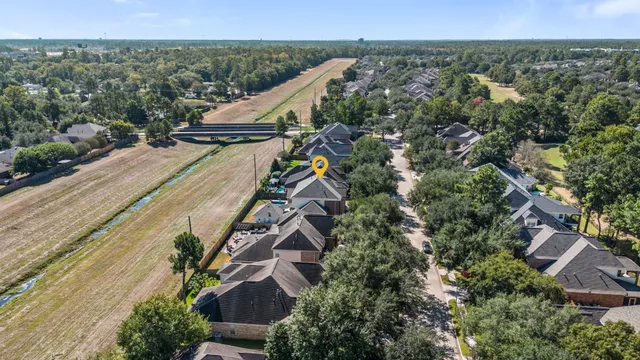 an aerial view of houses with outdoor space