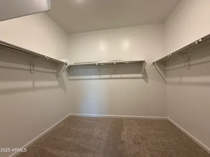 a view of a room with racks on the wall
