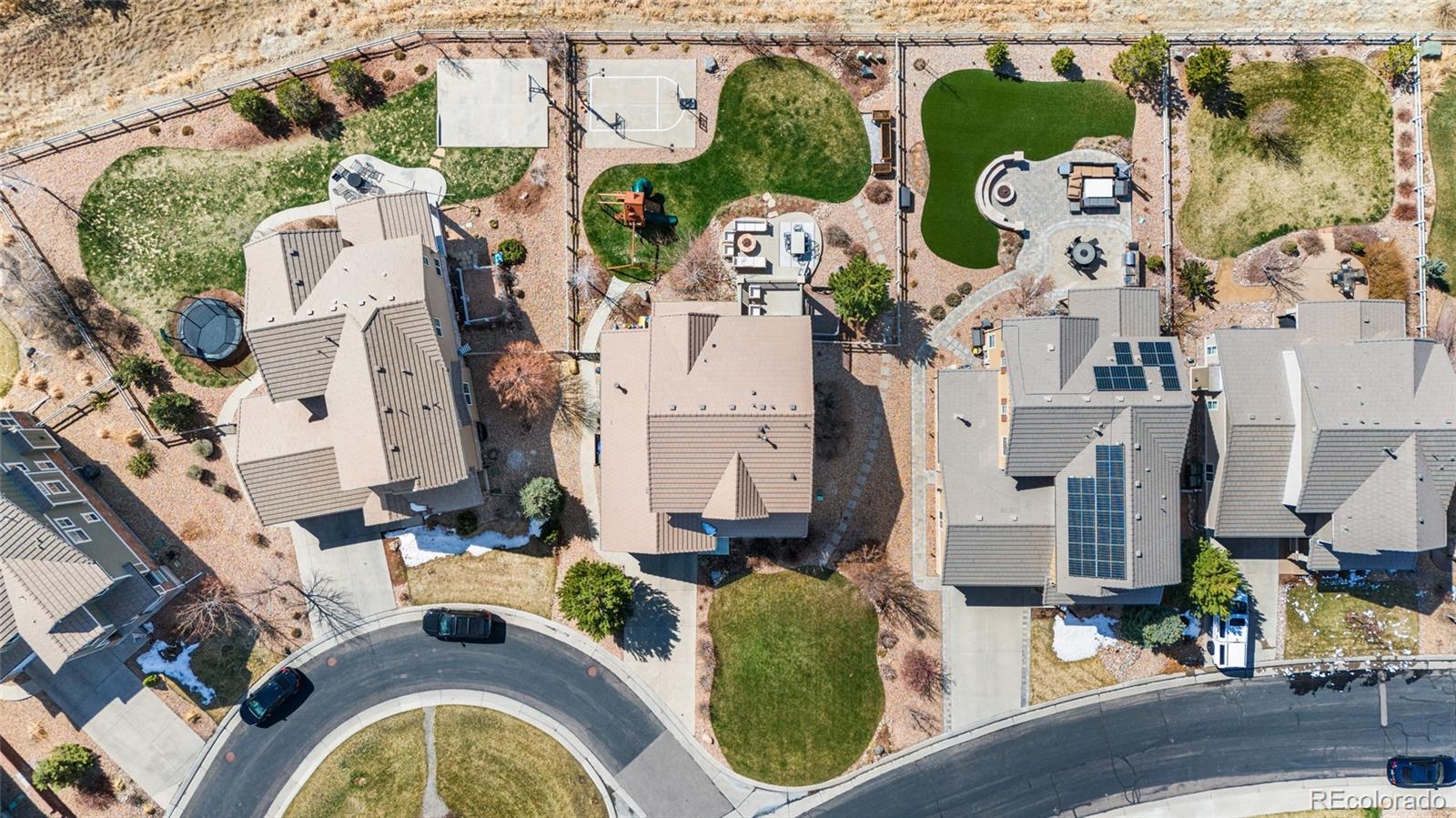 10451 Meadowleaf Way Highlands Ranch, CO 80126 - Photo 35 of 39 an aerial view of residential house with outdoor space and parking