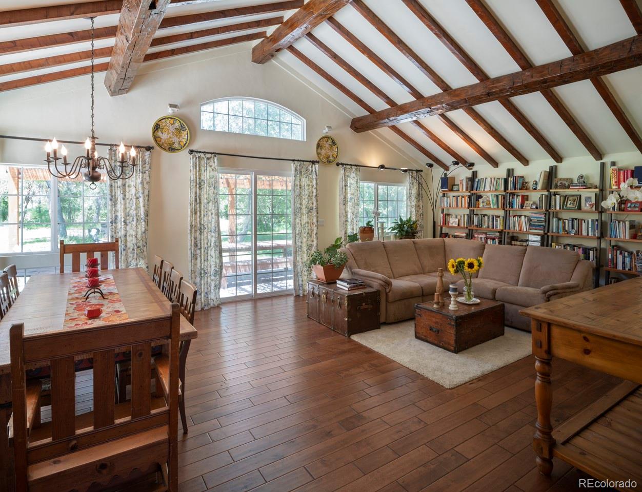 1085 Gapter Road Boulder, CO 80303 - Photo 11 of 24 a living room with furniture a rug and a large window