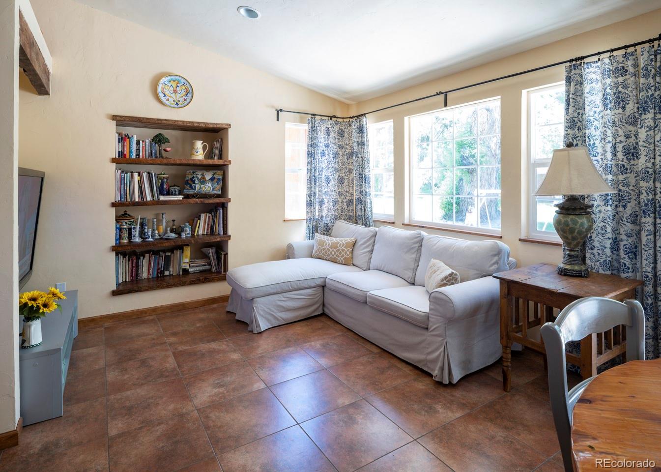 1085 Gapter Road Boulder, CO 80303 - Photo 14 of 24 a living room with furniture and a large window