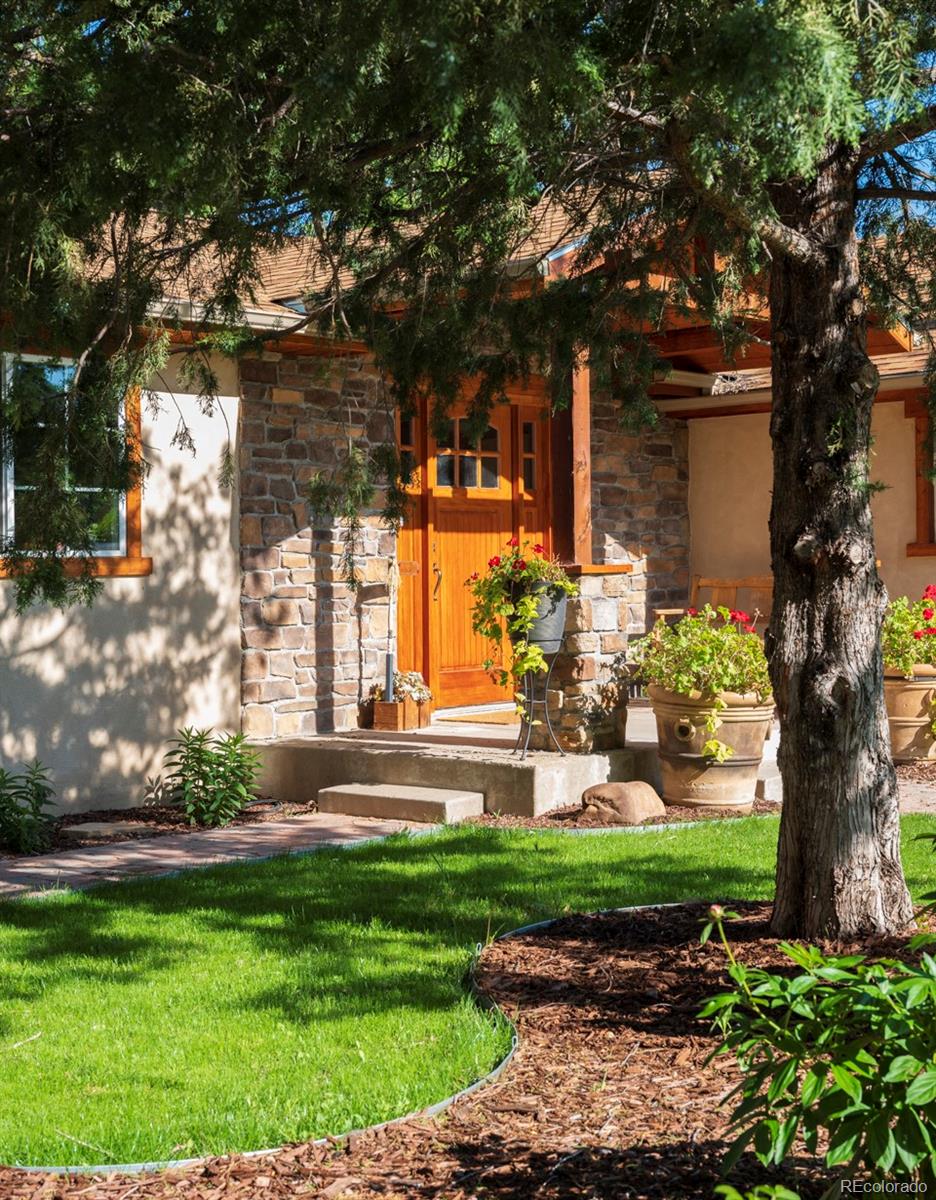 1085 Gapter Road Boulder, CO 80303 - Photo 4 of 24 front view of a house with a yard