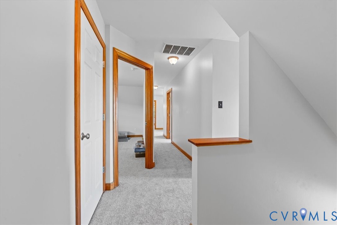 3137 Trenholm Road Powhatan, VA 23139 - Photo 29 of 72 Staircase featuring wood railings and newel posts