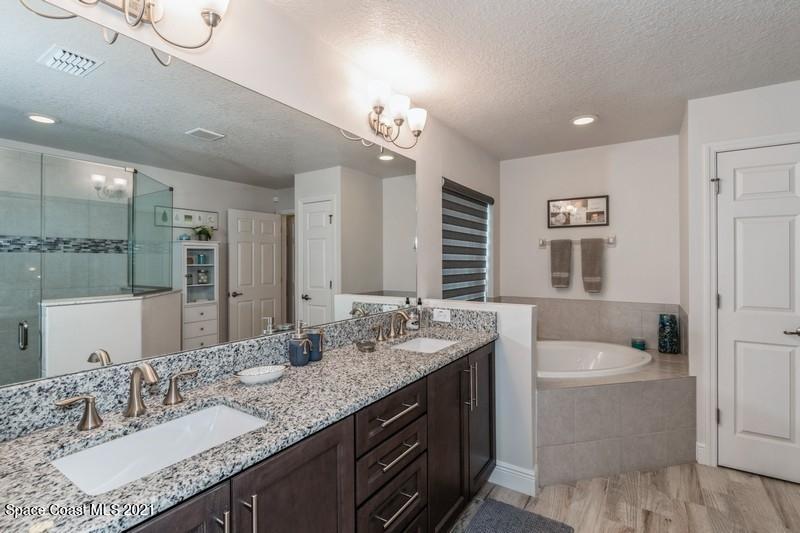 4072 Ruthann Circle Melbourne, FL 32934 - Photo 19 of 37 Master Luxury Bathroom