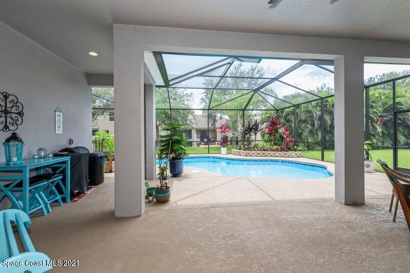 4072 Ruthann Circle Melbourne, FL 32934 - Photo 27 of 37 Lanai to Pool