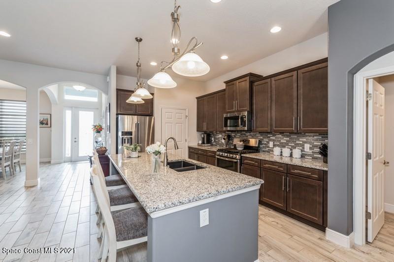 4072 Ruthann Circle Melbourne, FL 32934 - Photo 4 of 37 Kitchen to Entry