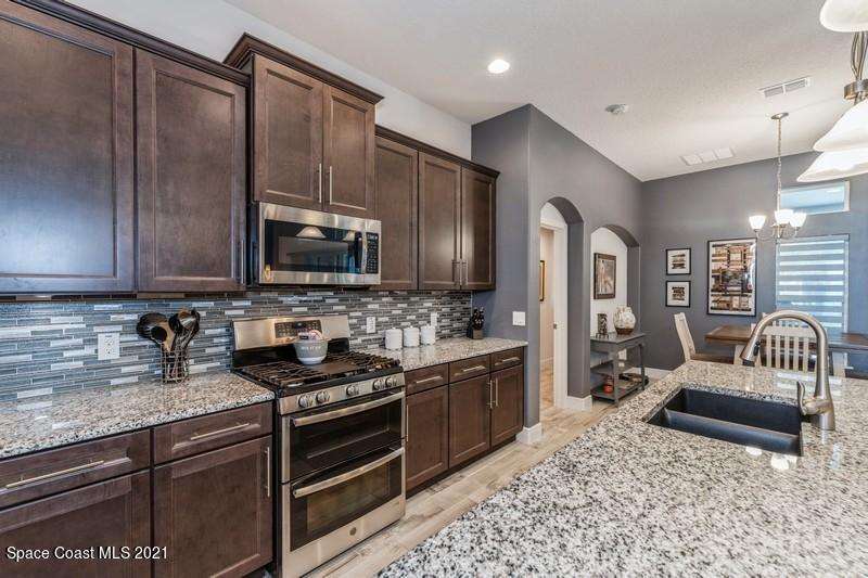 4072 Ruthann Circle Melbourne, FL 32934 - Photo 6 of 37 Gas Range & Double Oven
