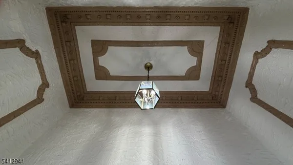 a close view of fireplace with wooden floor