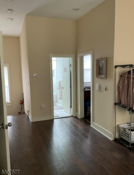 518 South Main Street, Unit 6 Phillipsburg, NJ 08865 - Photo 3 of 10 a view of a livingroom with wooden floor and a bathroom