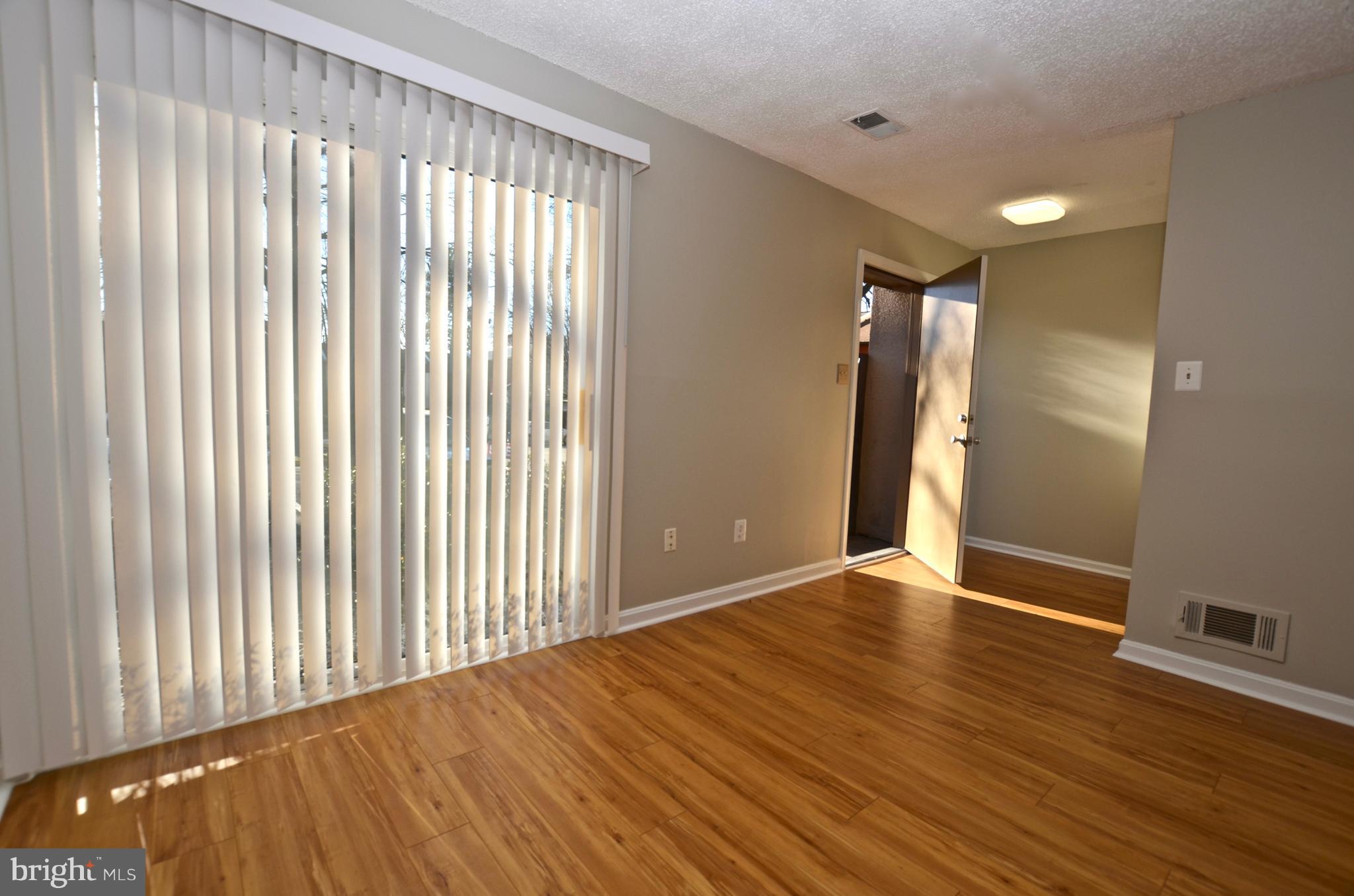 12136 Captiva Court Reston, VA 20191 - Photo 4 of 26 REPLACED FRONT SGD AND FRONT DOOR ALONG W/NEW VERT