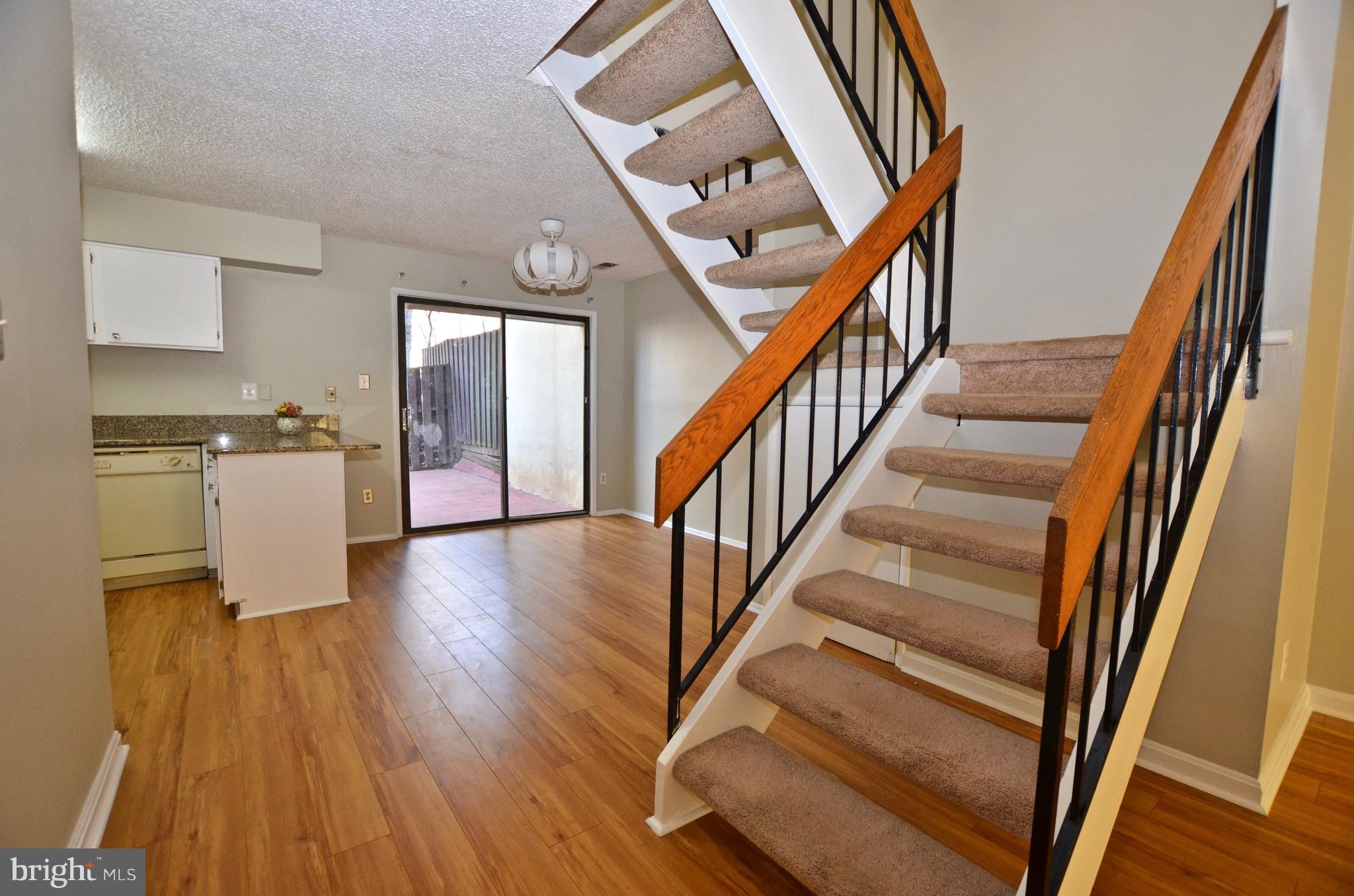 12136 Captiva Court Reston, VA 20191 - Photo 5 of 26 OPEN AND BRIGHT FEEL WITH FRONT AND BACK SGDS