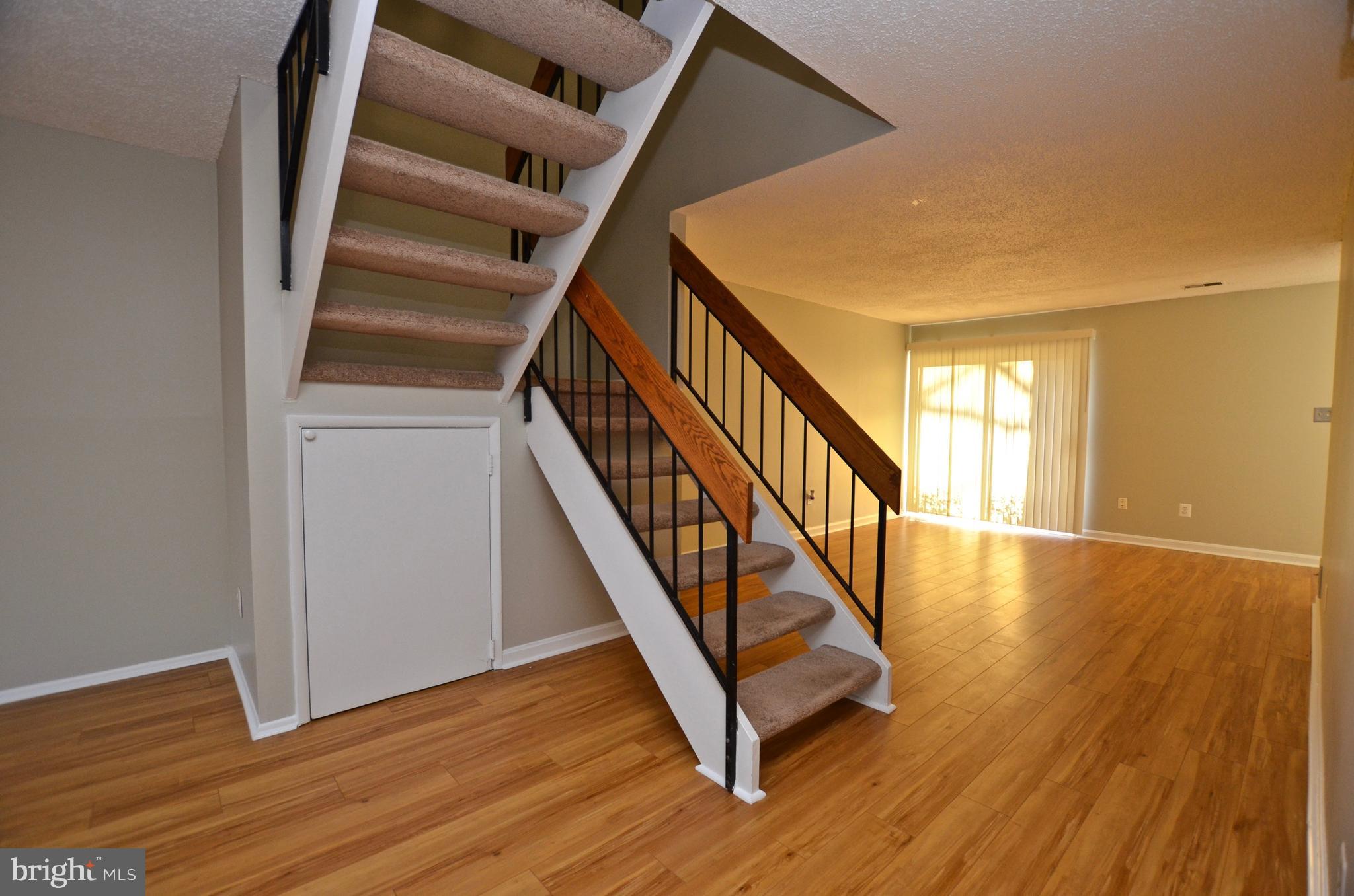 12136 Captiva Court Reston, VA 20191 - Photo 6 of 26 UNDER STAIR STORAGE, NEW UPGRADED WOOD LAM FLRS