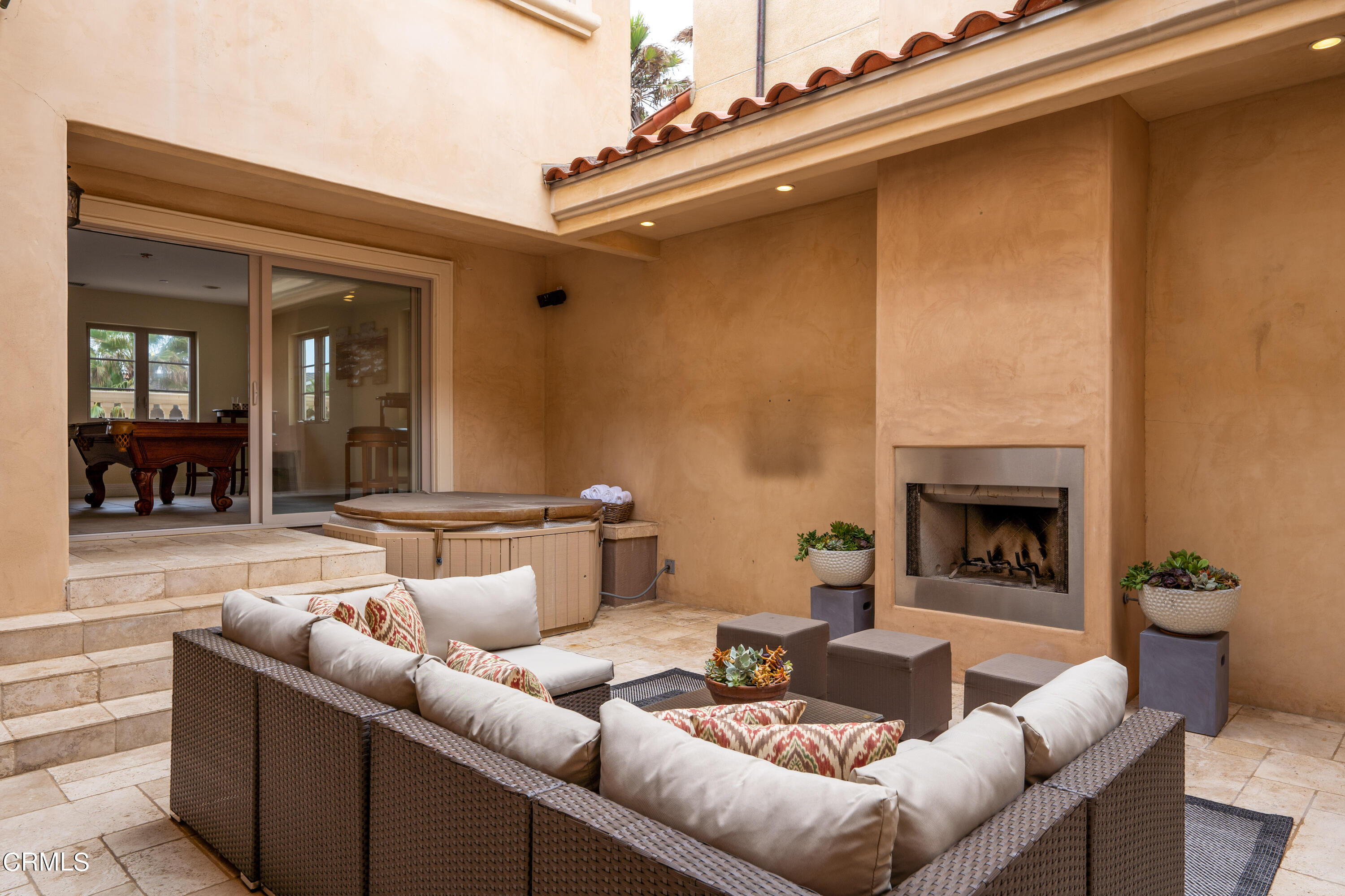 1065 Mandalay Beach Road Oxnard, CA 93035 - Photo 17 of 36 a living room with furniture and a fireplace