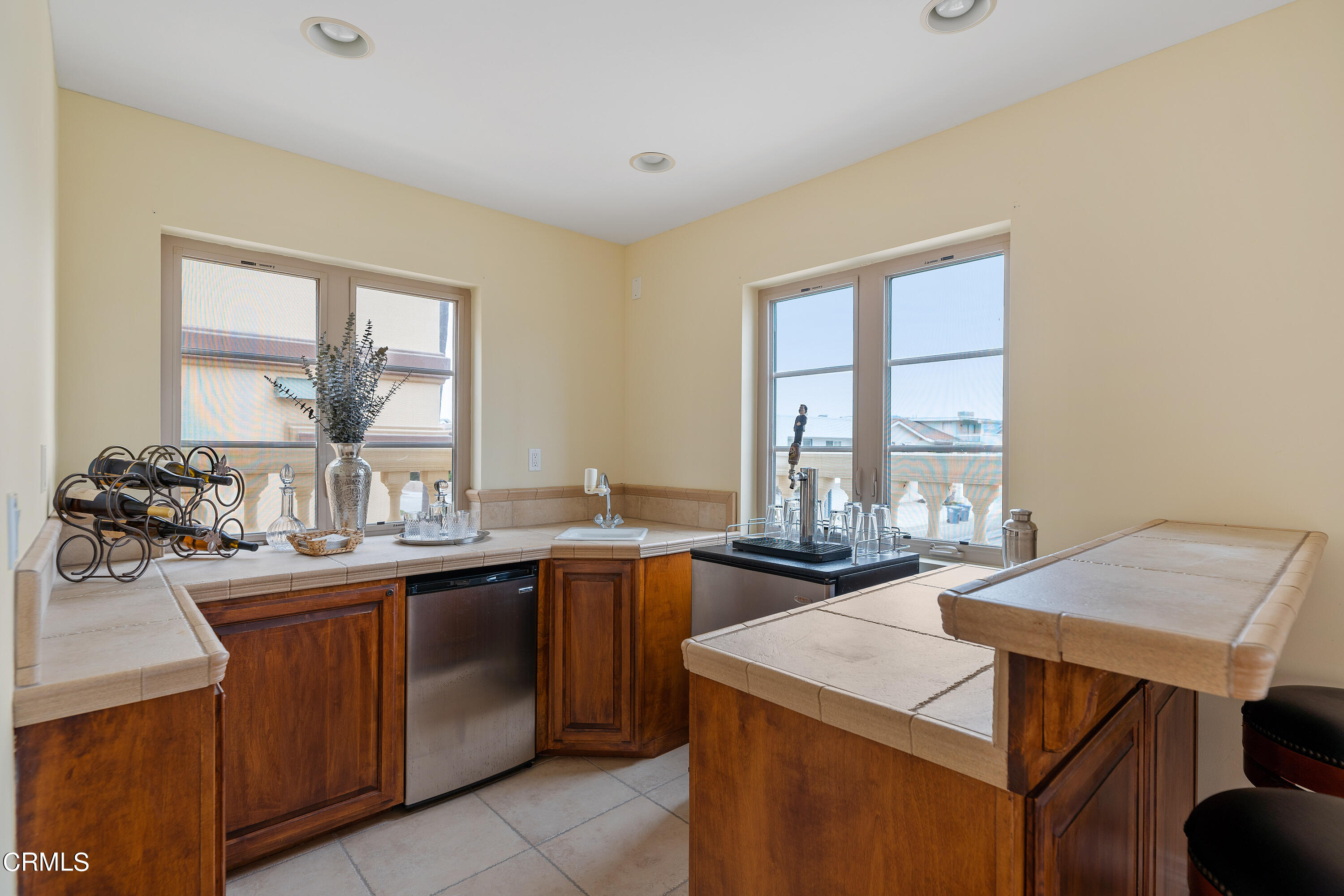 1065 Mandalay Beach Road Oxnard, CA 93035 - Photo 19 of 36 a kitchen with a sink stove and microwave