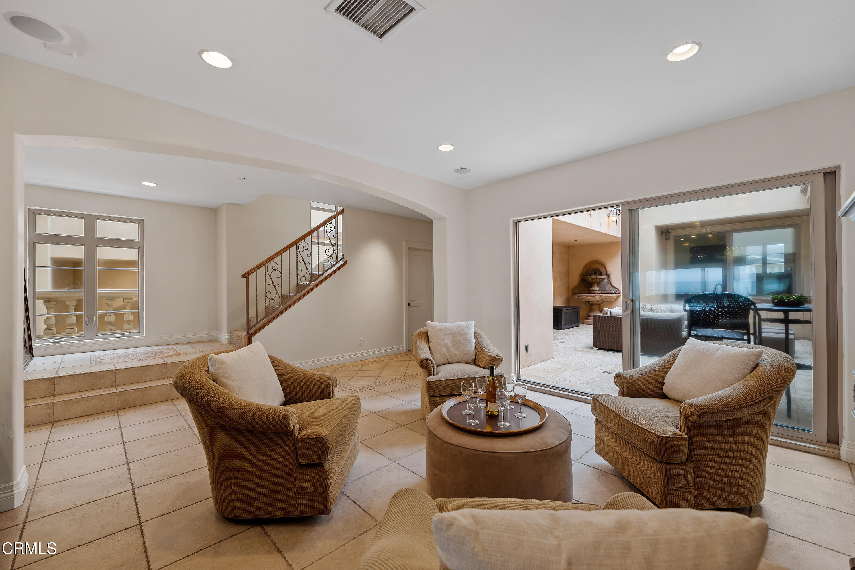 1065 Mandalay Beach Road Oxnard, CA 93035 - Photo 22 of 36 a living room with furniture and a table