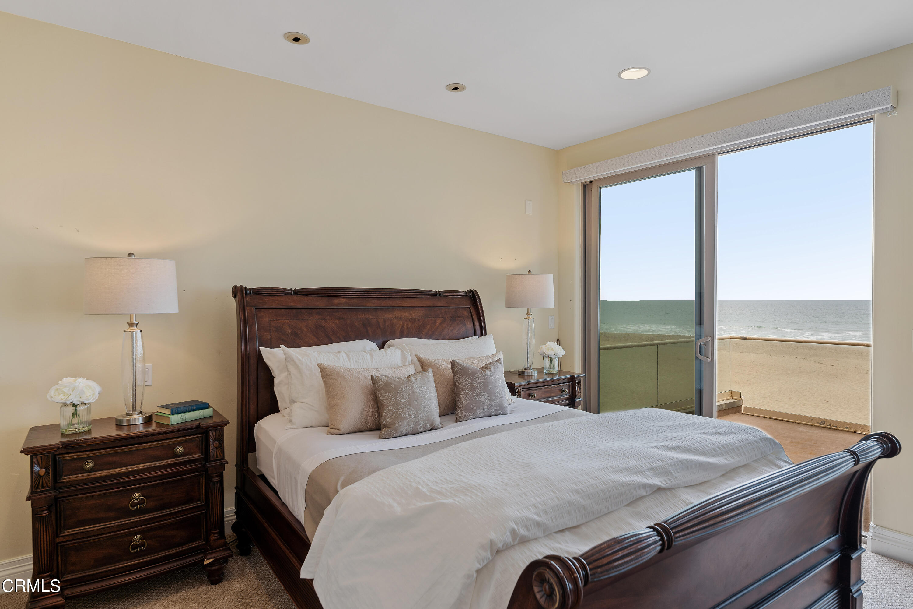 1065 Mandalay Beach Road Oxnard, CA 93035 - Photo 25 of 36 a bedroom with a bed and large window