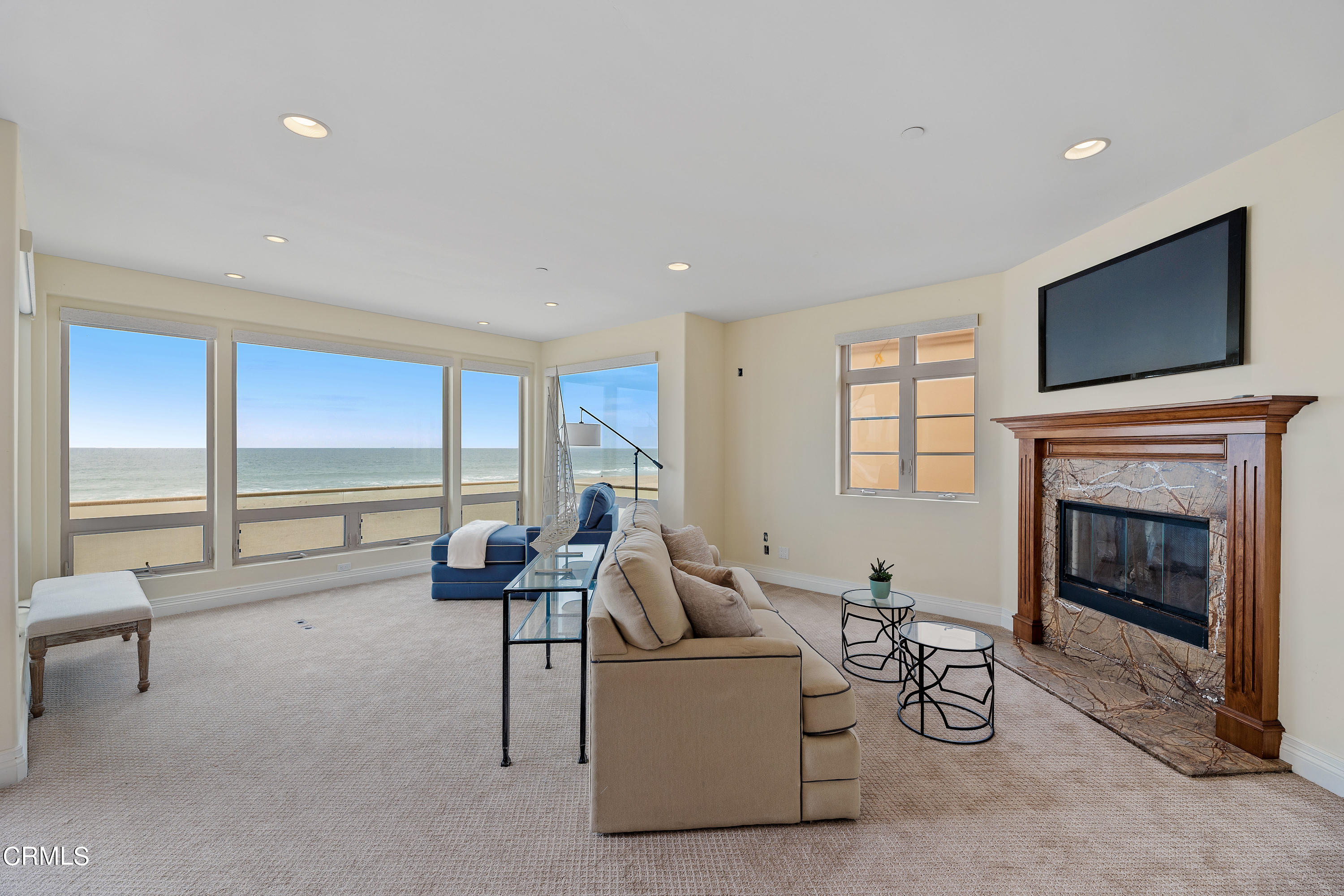 1065 Mandalay Beach Road Oxnard, CA 93035 - Photo 26 of 36 a living room with furniture and a fireplace