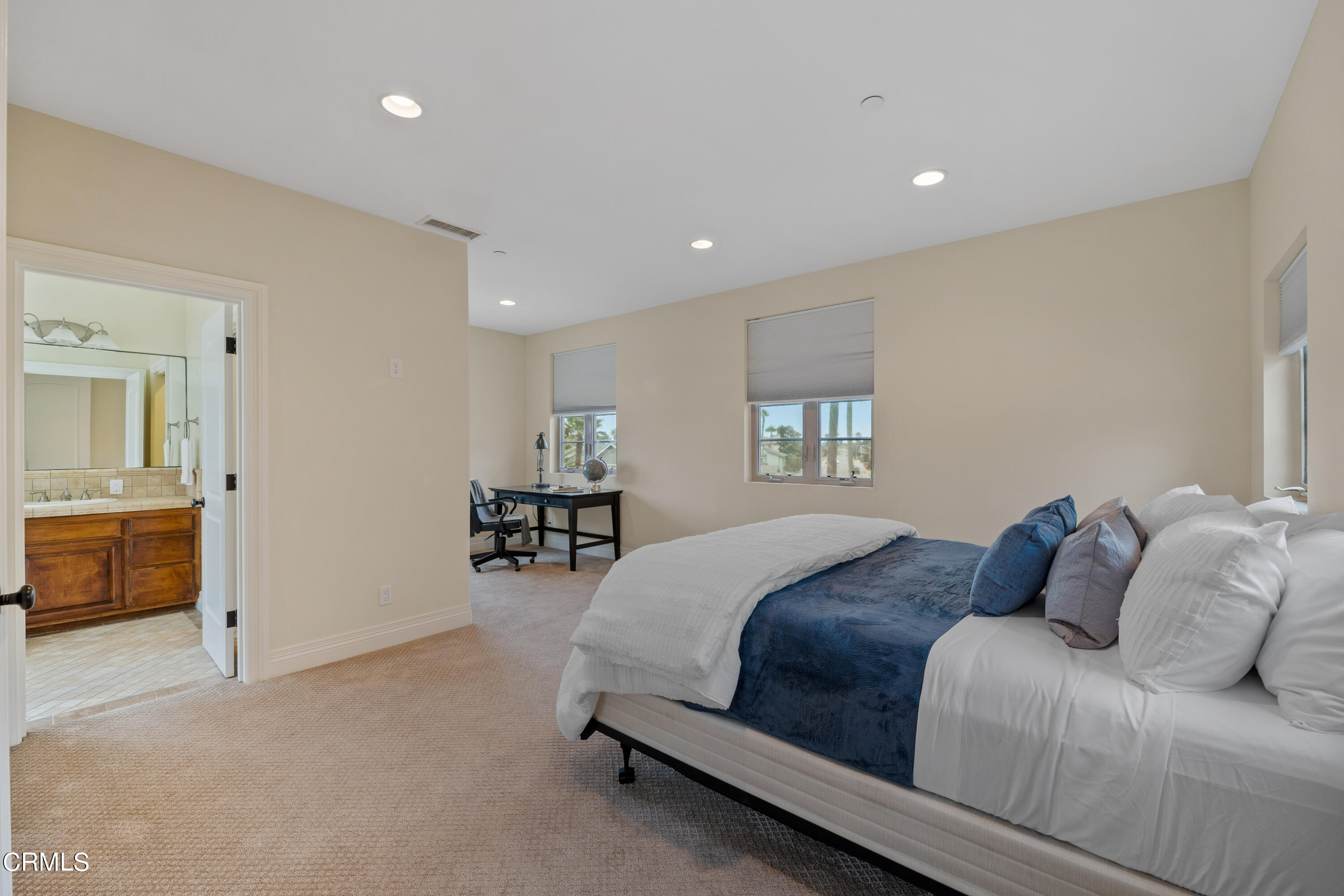 1065 Mandalay Beach Road Oxnard, CA 93035 - Photo 29 of 36 a bedroom with a bed and a table