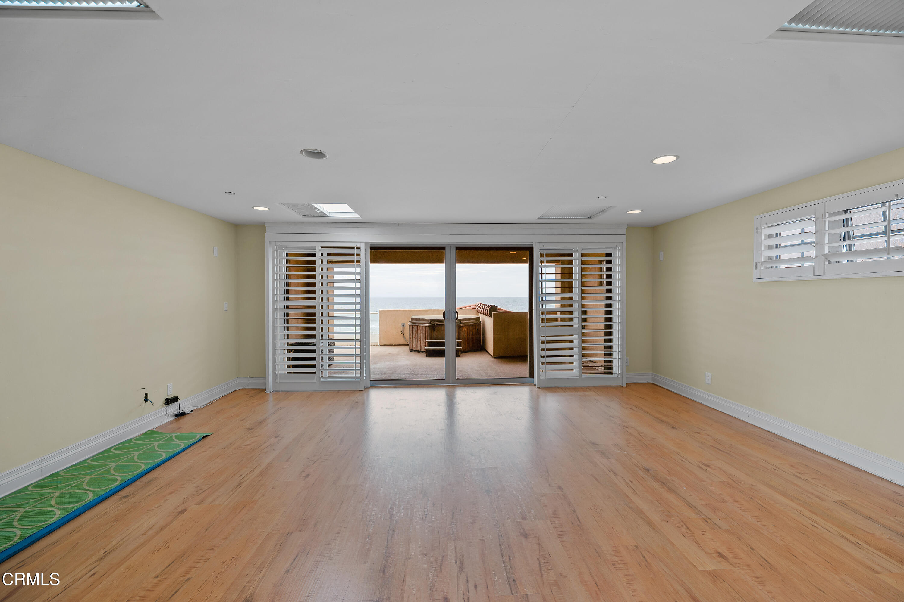 1065 Mandalay Beach Road Oxnard, CA 93035 - Photo 33 of 36 a view of a room with wooden floor and a window
