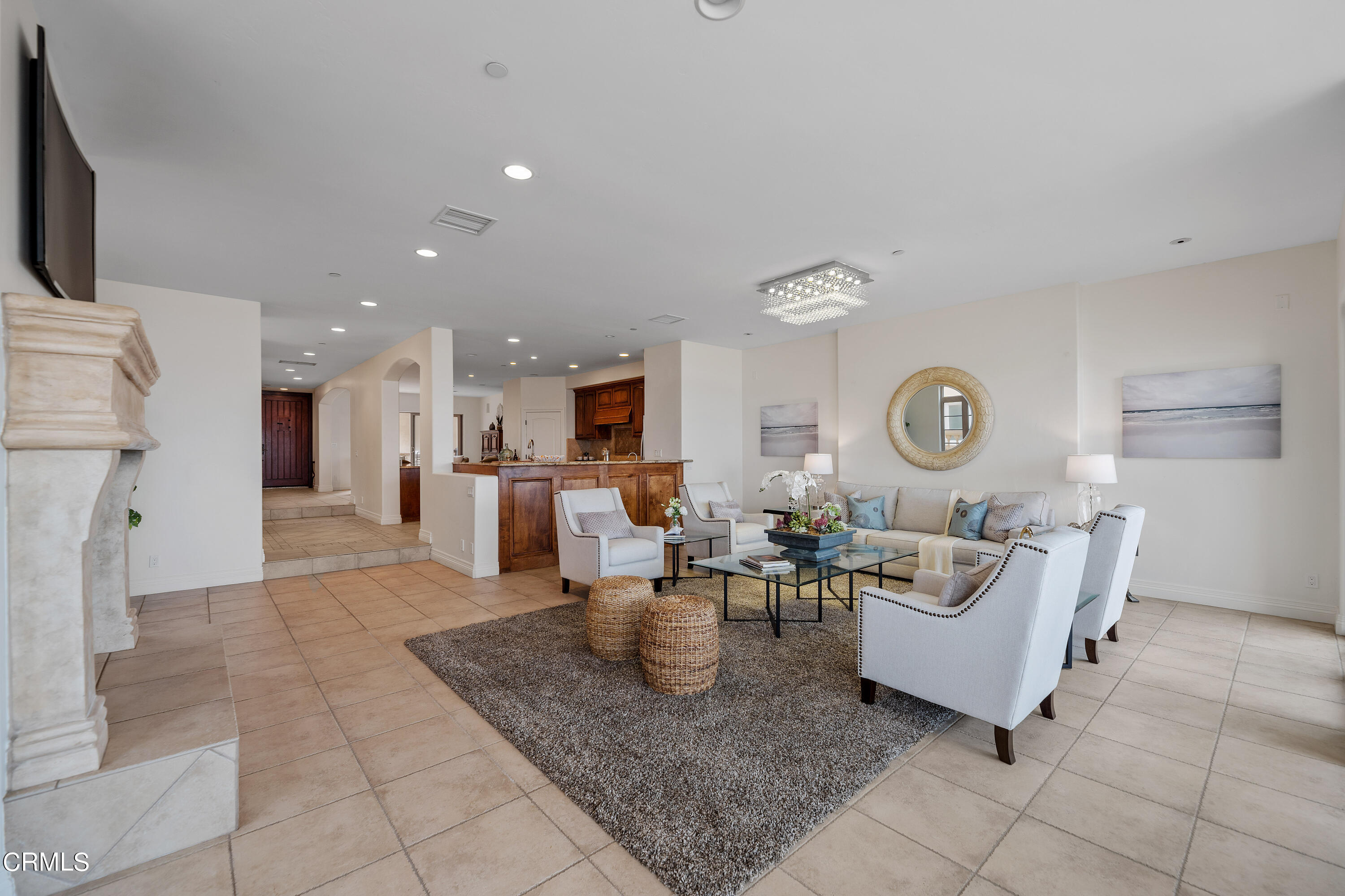 1065 Mandalay Beach Road Oxnard, CA 93035 - Photo 8 of 36 a living room with furniture and a fireplace