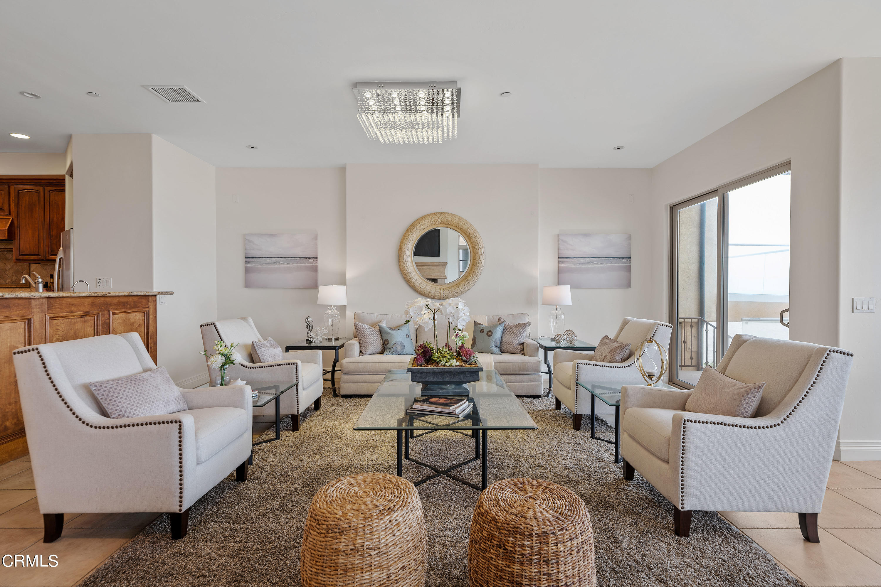 1065 Mandalay Beach Road Oxnard, CA 93035 - Photo 10 of 36 a living room with furniture a rug and a large window
