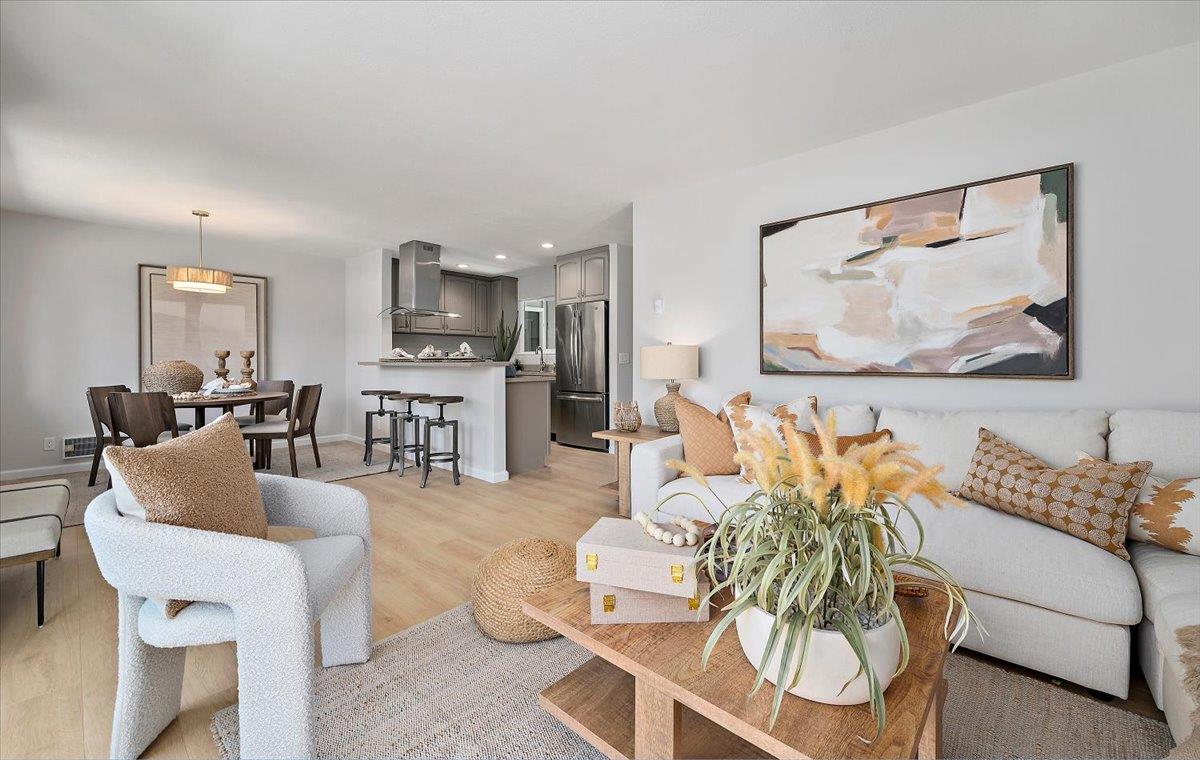 1093 Reed Avenue, Unit C Sunnyvale, CA 94086 - Photo 2 of 16 a living room with furniture and a painting