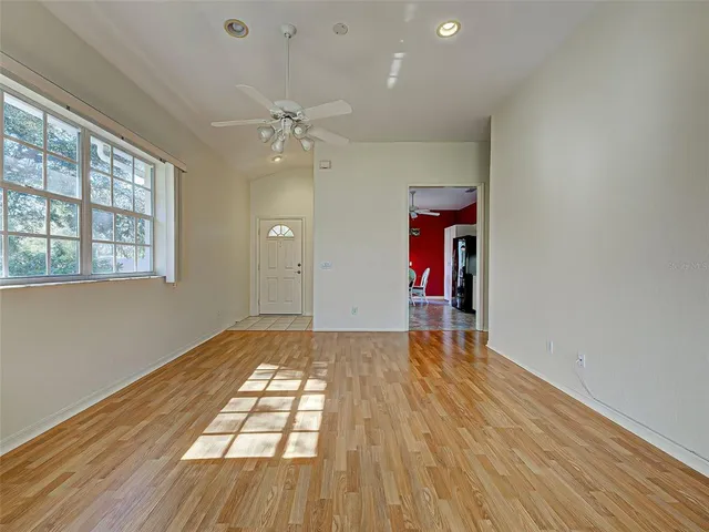 a view of a back yard from a room