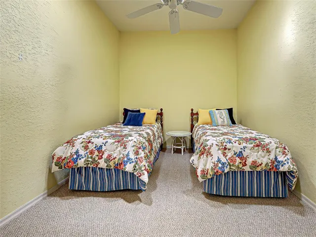 an aerial view of a house with outdoor space