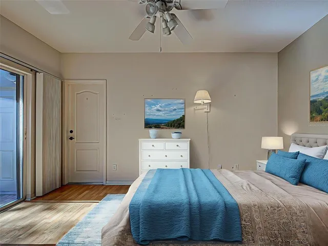 an aerial view of a house with a yard basket ball court and outdoor seating