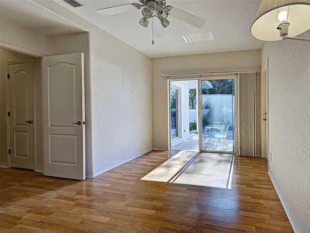 an aerial view of a houses with a swimming pool