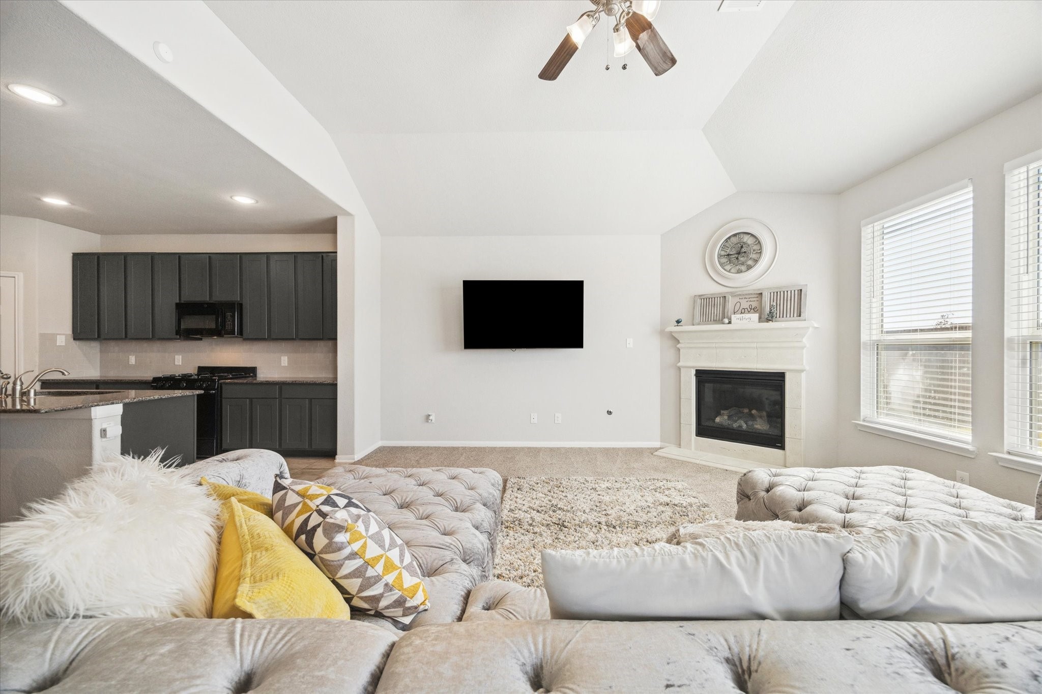 322 Upland Grv Trail Rosharon, TX 77583 - Photo 14 of 36 a living room with furniture fireplace and flat screen tv
