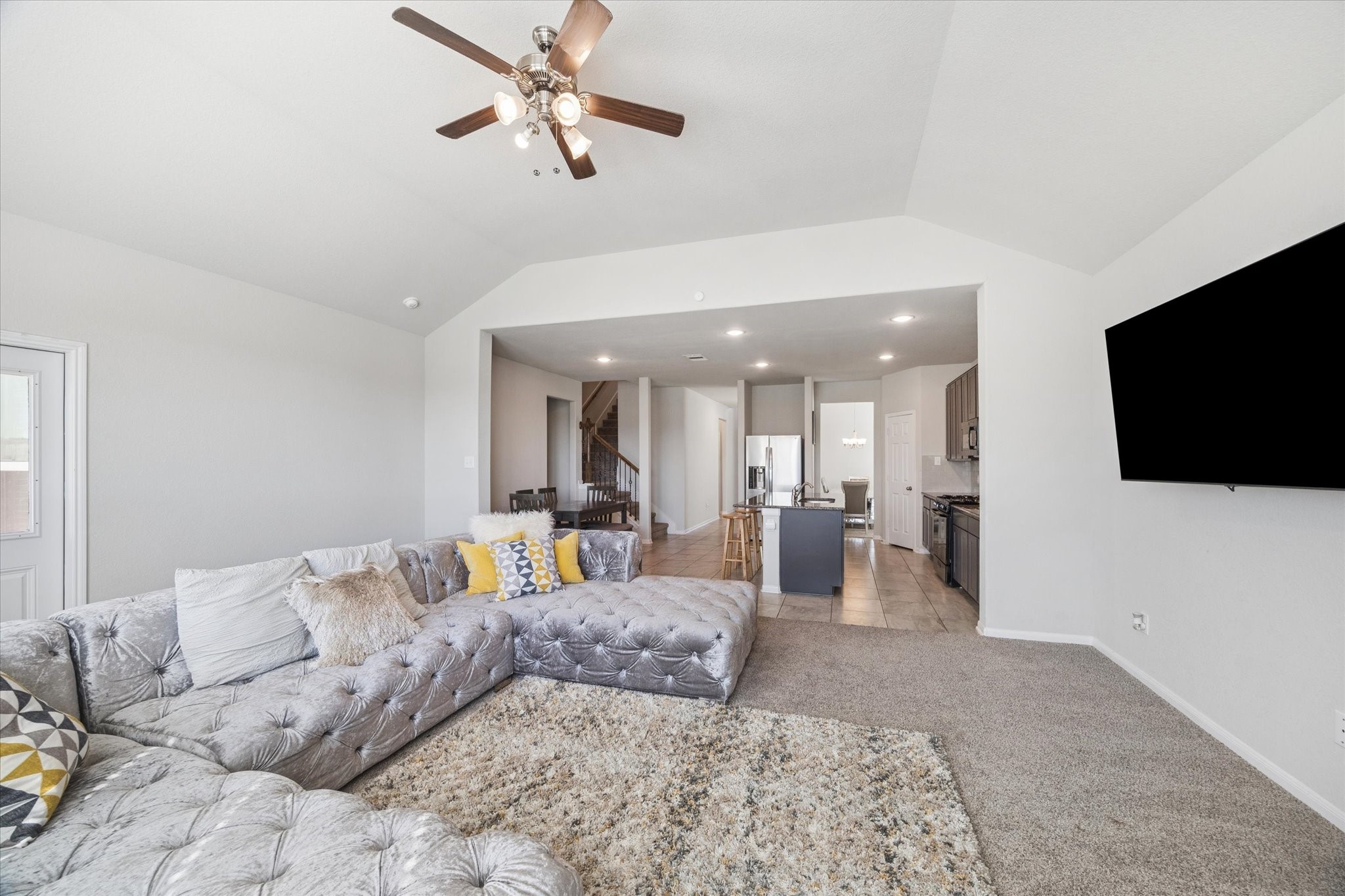 322 Upland Grv Trail Rosharon, TX 77583 - Photo 15 of 36 a living room with furniture and a flat screen tv