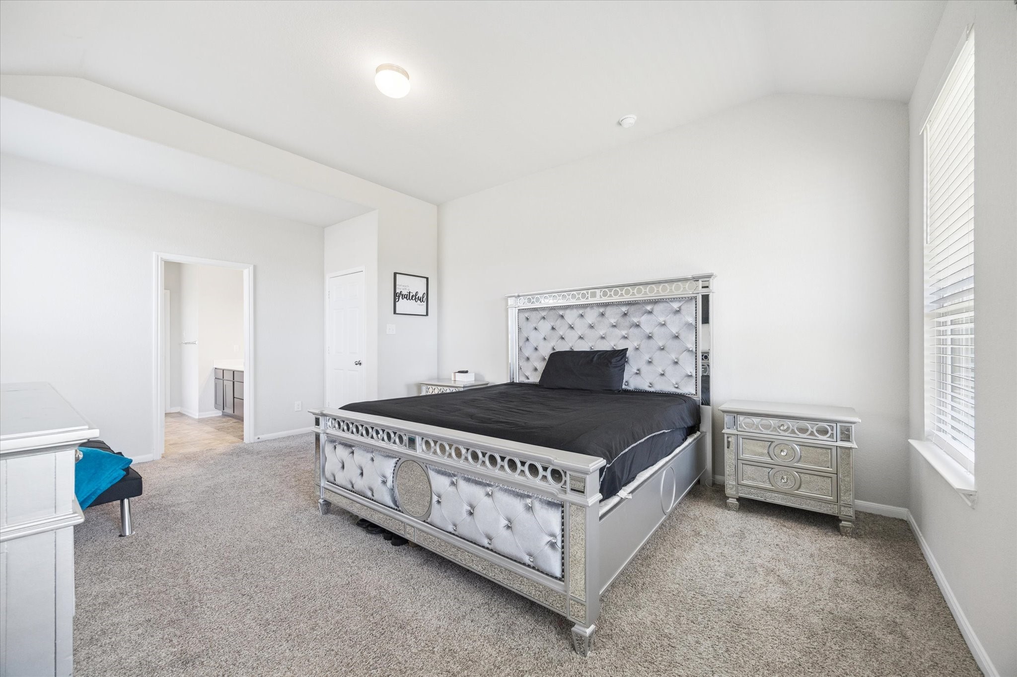 322 Upland Grv Trail Rosharon, TX 77583 - Photo 19 of 36 a bedroom with a bed and a window